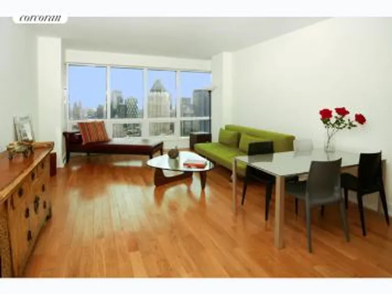 New York City Real Estate | View 350 West 42Nd Street, 54C | LR w/Dining Area | View 2