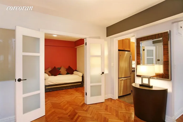 New York City Real Estate | View 177 East 77th Street, 3D | Gracious foyer, herringbone floors, & 2nd Bedroom | View 3