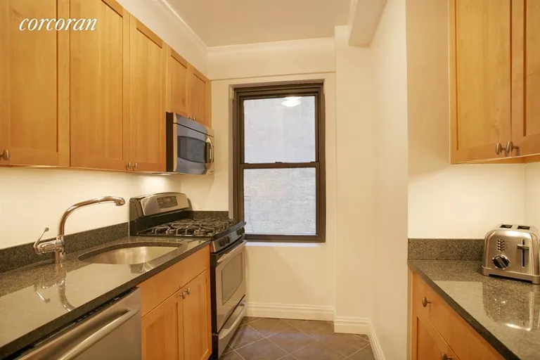 New York City Real Estate | View 177 East 77th Street, 3D | Windowed KItchen, top of the line appliances | View 4