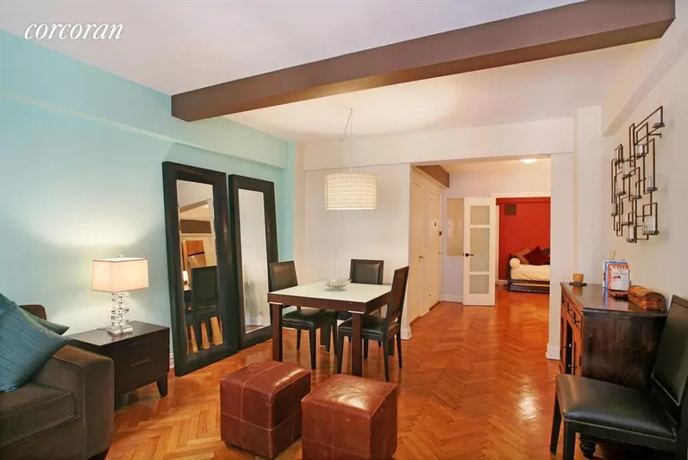New York City Real Estate | View 177 East 77th Street, 3D | Dining area at end of long Living Room, off foyer | View 2