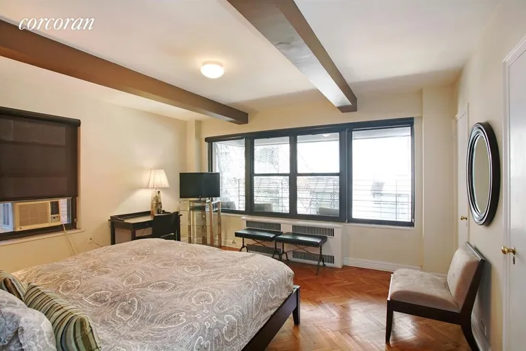 New York City Real Estate | View 177 East 77th Street, 3D | Square, serene Master Bedroom  facing balcony | View 5