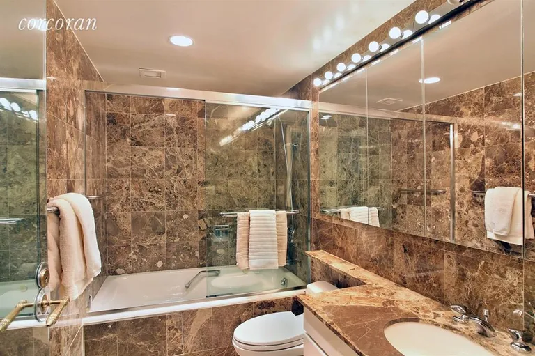 New York City Real Estate | View 157 East 74th Street, 10B | Master Bathroom | View 5