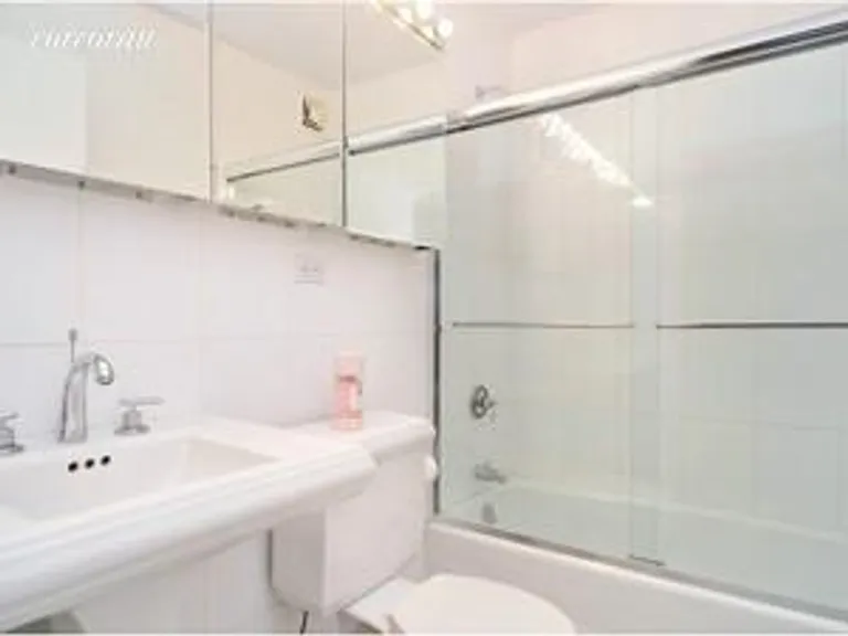 New York City Real Estate | View 301 East 79th Street, 8R | Marble Bathroom | View 6
