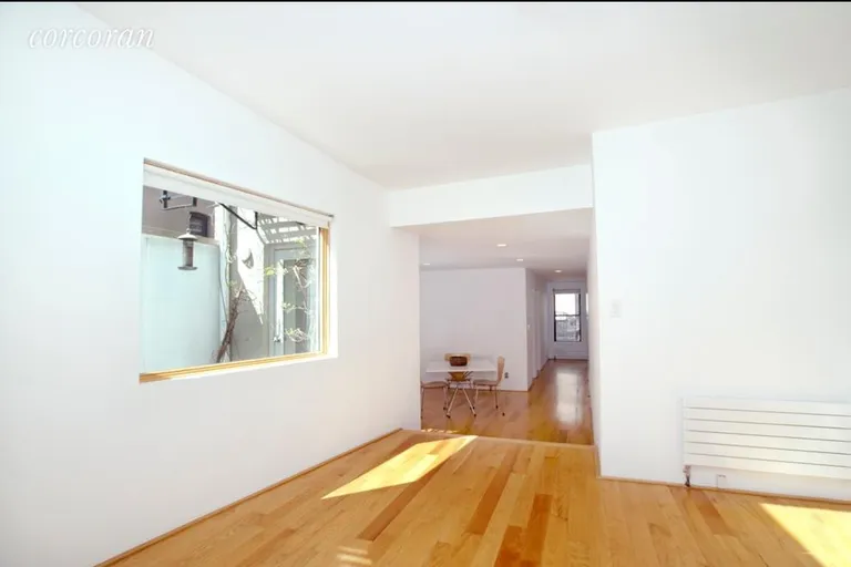 New York City Real Estate | View 50-11 5th Street | Living Room/Kitchen First Floor | View 3