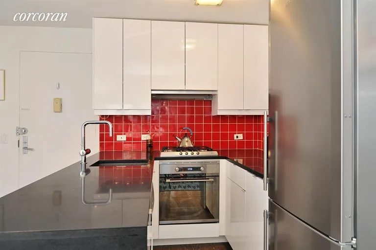 New York City Real Estate | View 209 East 56th Street, 11M | Kitchen With Granite Counters & Hi End Appliances | View 4