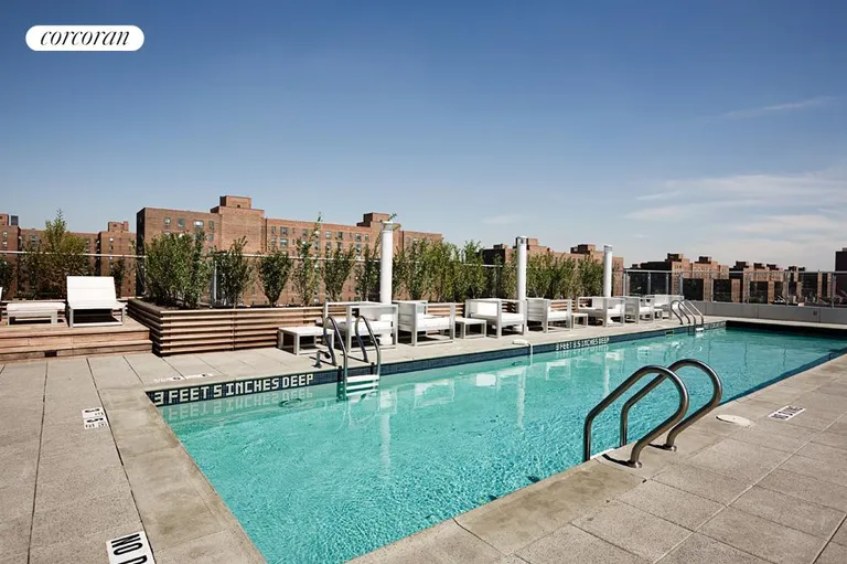 New York City Real Estate | View 425 East 13th Street, PHB | Rooftop swimming pool w/ cabanas and barbeque area | View 6