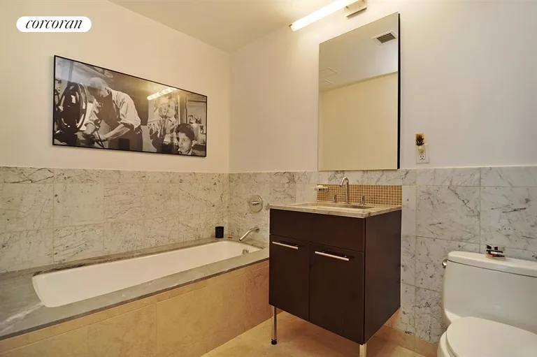 New York City Real Estate | View 261 West 28th Street, 5C | Master Bathroom | View 4
