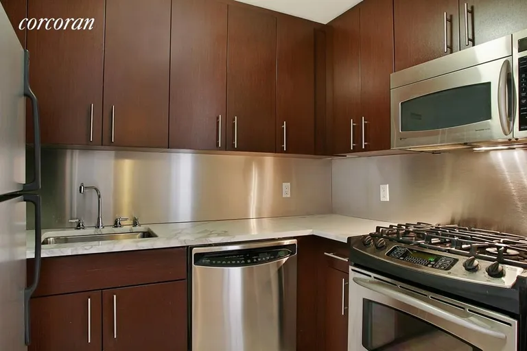 New York City Real Estate | View 350 West 53rd Street, 6E | Full Size Kitchen | View 2