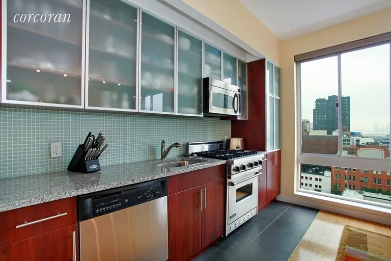 New York City Real Estate | View 555 West 23rd Street, S15G | Bright Windowed Kitchen! | View 3