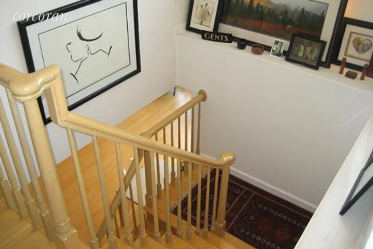 New York City Real Estate | View 1400 Fifth Avenue, 7D | Staircase with soffet for displaying art. | View 4