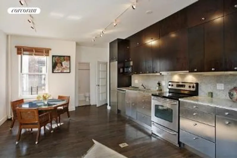 New York City Real Estate | View 26 Gramercy Park South, 9EF | Open Kitchen with Living/Dining Areas | View 2