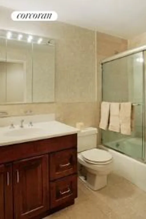 New York City Real Estate | View 44 East 12th Street, 7A | Marble bathroom | View 5