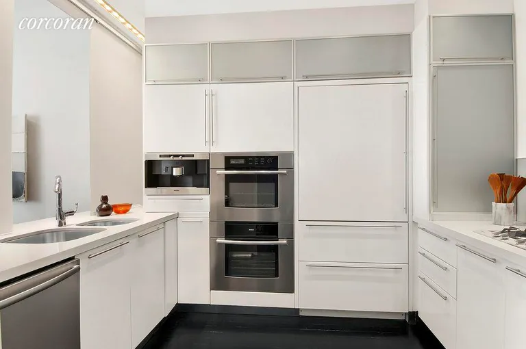 New York City Real Estate | View 92 Greene Street, 5 | Kitchen featuring top of the line appliances | View 2