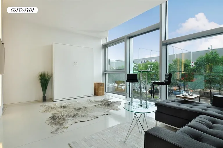 New York City Real Estate | View 100 Eleventh Avenue, 3B | Custom Murphy bed and CitiQuiet windows installed | View 2