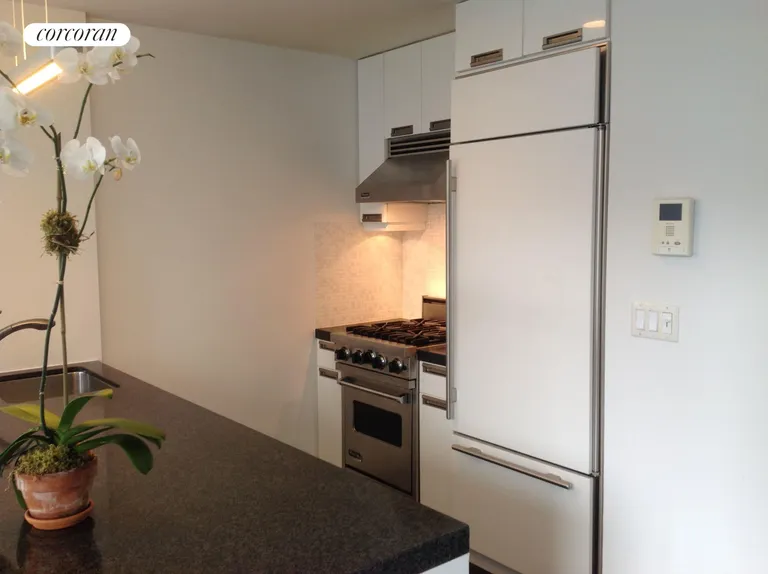 New York City Real Estate | View 261 West 28th Street, 10A | Open Kitchen | View 4