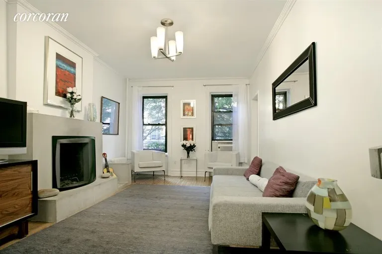New York City Real Estate | View 202 Saint Marks Avenue, 2 | Complete w cozy wood burning fireplace... | View 3