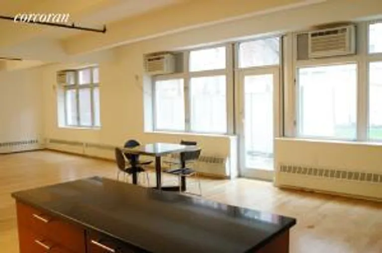 New York City Real Estate | View 970 Kent Avenue, G06 | 1 Bed, 2 Baths | View 1