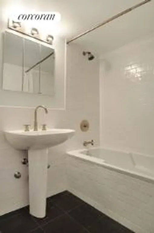 New York City Real Estate | View 70 East 10th Street, 12D | New Bathroom | View 4