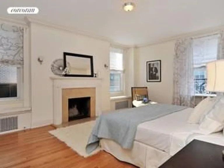 New York City Real Estate | View 417 Park Avenue, 4W | Wood-burning fireplace.  2 exposures. | View 3