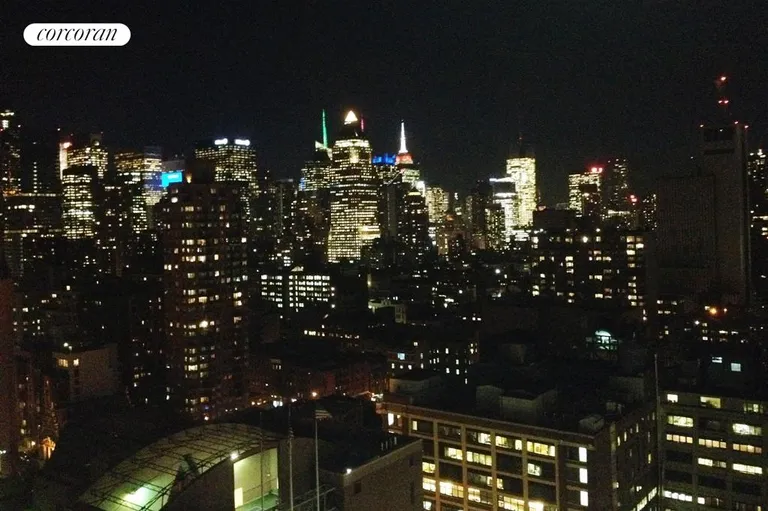 New York City Real Estate | View 555 West 59th Street, 28C | Evening view of midtown skyline | View 7