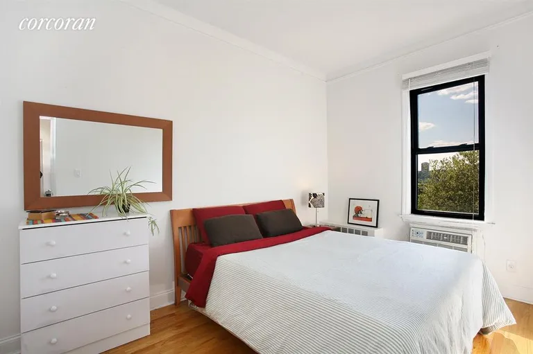 New York City Real Estate | View 660 Riverside Drive, 6H | Bedroom with tree-top views. | View 3