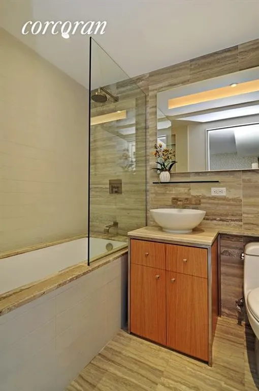 New York City Real Estate | View 322 West 57th Street, 47Q1 | Master Bathroom | View 5