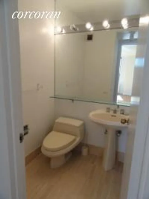 New York City Real Estate | View 255 East 49th Street, 10B | Guest Bathroom | View 8