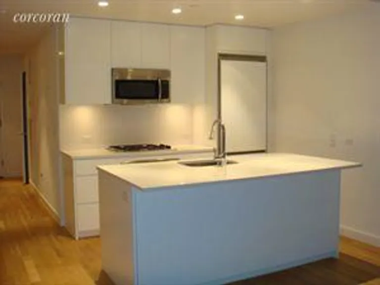 New York City Real Estate | View 90 William Street, 6G | Island Kitchen | View 2