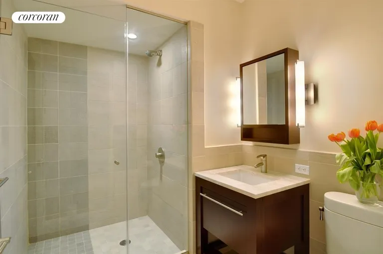 New York City Real Estate | View 101 West 24th Street, 10B | Two spa-like Bathrooms | View 4