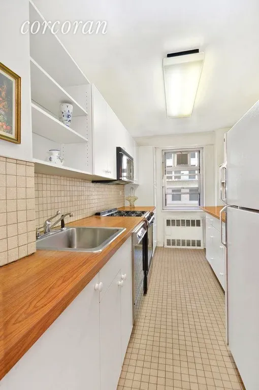 New York City Real Estate | View 70 East 10th Street, 6W | 70 East 10th #6W, New York (70_E_10_#6W_Kitchen_MGlass) | View 3