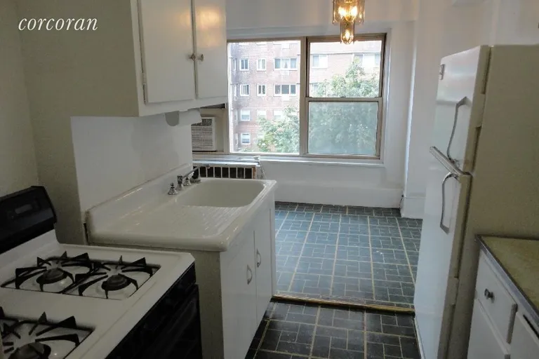 New York City Real Estate | View 125 Ashland Place, 5C | Double Galley Kitchen & Dining Area | View 4