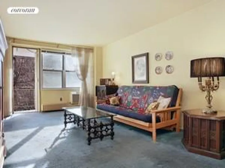 New York City Real Estate | View 303 West 66th Street, 4GE | Sunflooded Living Room | View 2