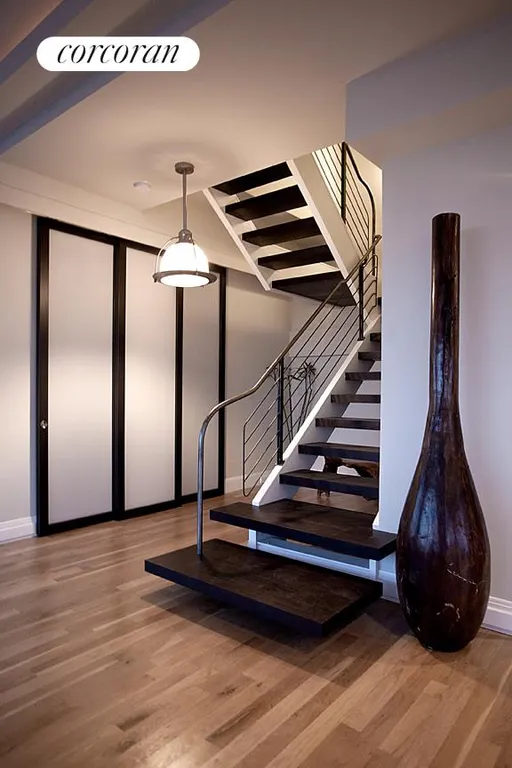 New York City Real Estate | View 240 East 10th Street, PH16A | Custom made Staircase. | View 7