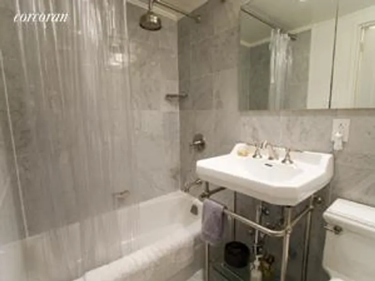New York City Real Estate | View 67 East 11th Street, 323 | Marble Bathroom | View 5