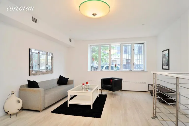 New York City Real Estate | View 406 Lorimer Street, A | 2 Beds, 1 Bath | View 1