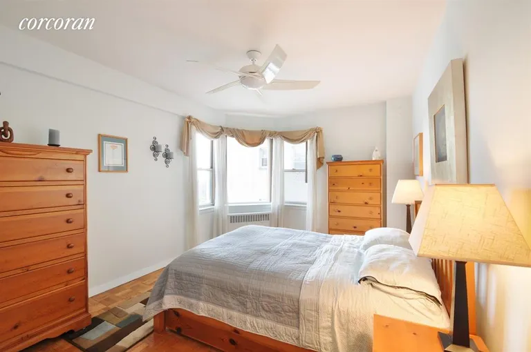 New York City Real Estate | View 34 Plaza Street East, 902 | Spacious bedroom with stunning views and walk-in closet. | View 4