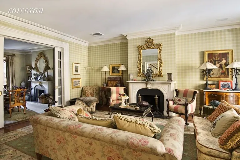 New York City Real Estate | View 128 East 93rd Street | Living Room with Fireplace | View 3