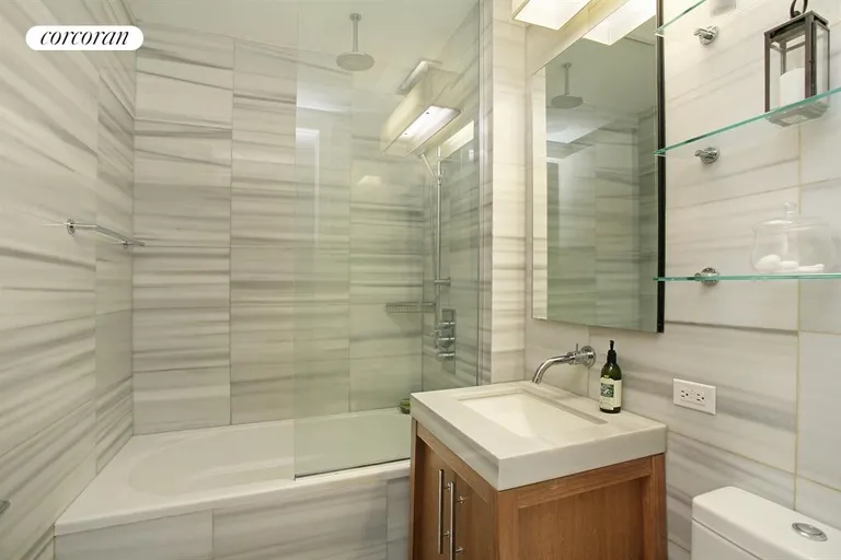 New York City Real Estate | View 88 Greenwich Street, 1401 | Modern bathroom with high-end finishes | View 3