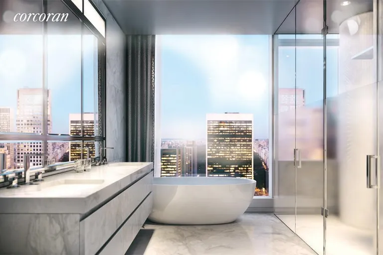 New York City Real Estate | View 20 West 53rd Street, 26B | Master bath with Lido white marble and soaking tub | View 3