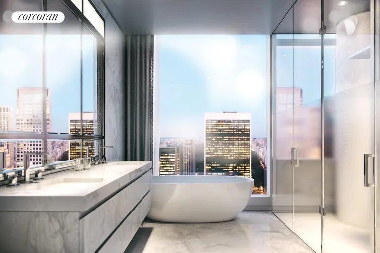 New York City Real Estate | View 20 West 53rd Street, 22A | Master bath with Lido white marble and soaking tub | View 3