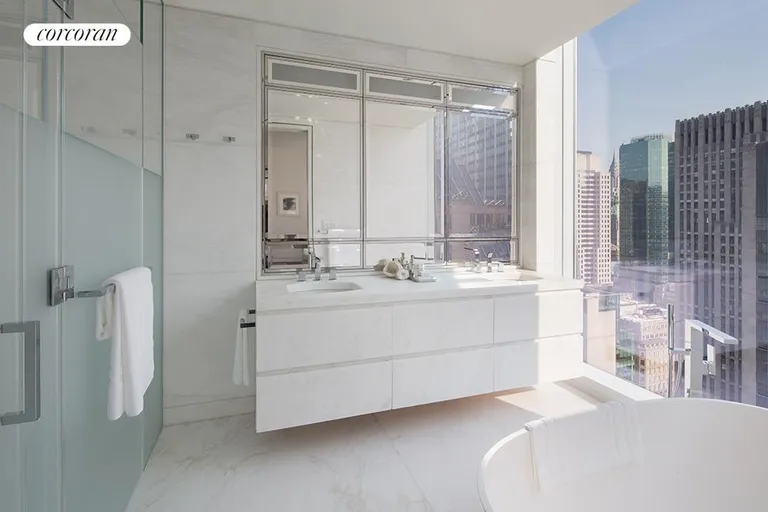 New York City Real Estate | View 20 West 53rd Street, 39B | Master bath with Lido white marble and soaking tub | View 5