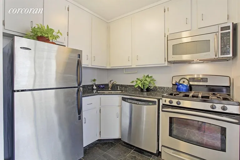 New York City Real Estate | View 333 East 45th Street, 20D | Open kitchen makes cooking a dream. | View 2