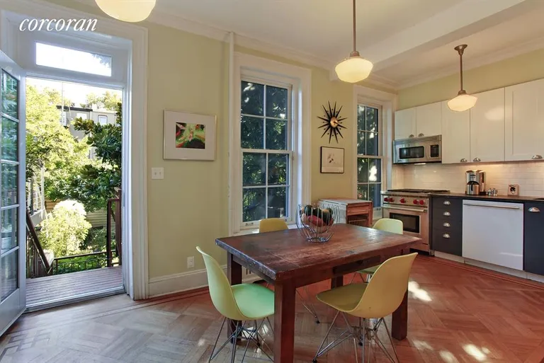 New York City Real Estate | View 102 Douglass Street | Eat-in kitchen with door to the deck and garden | View 6