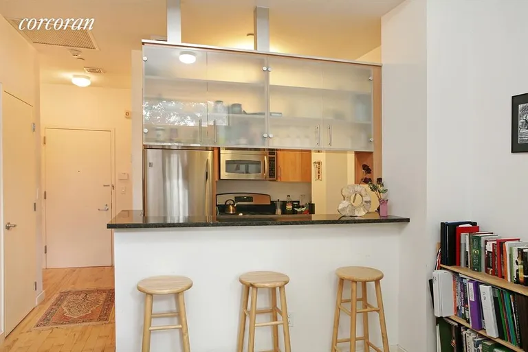 New York City Real Estate | View 227 East 111th Street, 1B | Open kitchen with stainless steel appliances | View 2