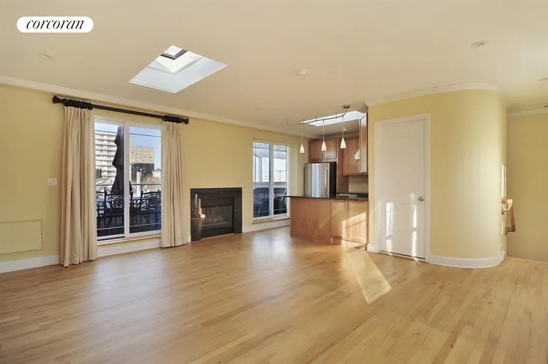 New York City Real Estate | View 1-84 Beach 101st Street, 2C | Living Room with Skylights and Open Chef's Kitchen | View 4