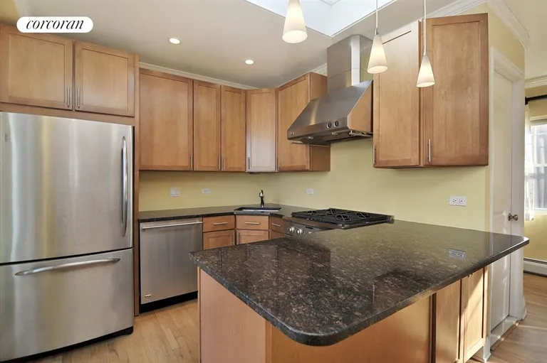 New York City Real Estate | View 1-84 Beach 101st Street, 2C | Chef's Kitchen with GE Stainless Steel Appliances | View 5