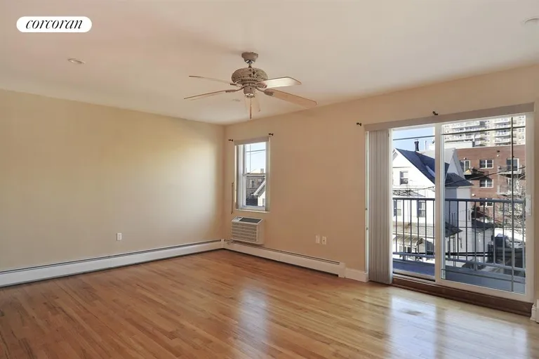 New York City Real Estate | View 1-84 Beach 101st Street, 2C | Master Bedroom with Balcony | View 7