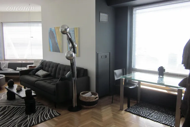 New York City Real Estate | View 301 West 57th Street, 44E | Living Room -Dining Area | View 4