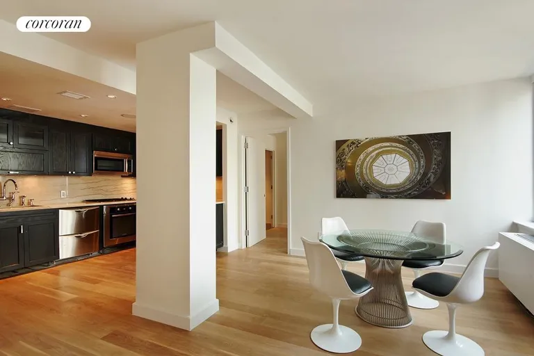 New York City Real Estate | View 333 Rector Place, PH1W | Open L-shaped kitchen open to a separate windowed dining area which are perfect for the entertainer. | View 2