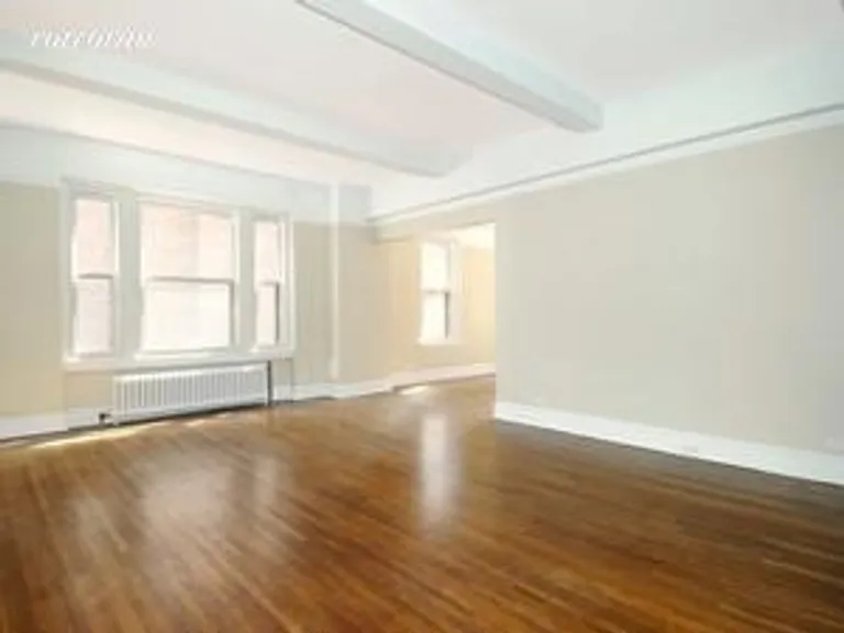New York City Real Estate | View 77 Park Avenue, 8F | Living room leading towards Dining room | View 2